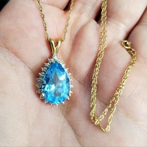 10k AMAZING blue topaz & diamond necklace! Pendant stamped 10kP which is plumb m